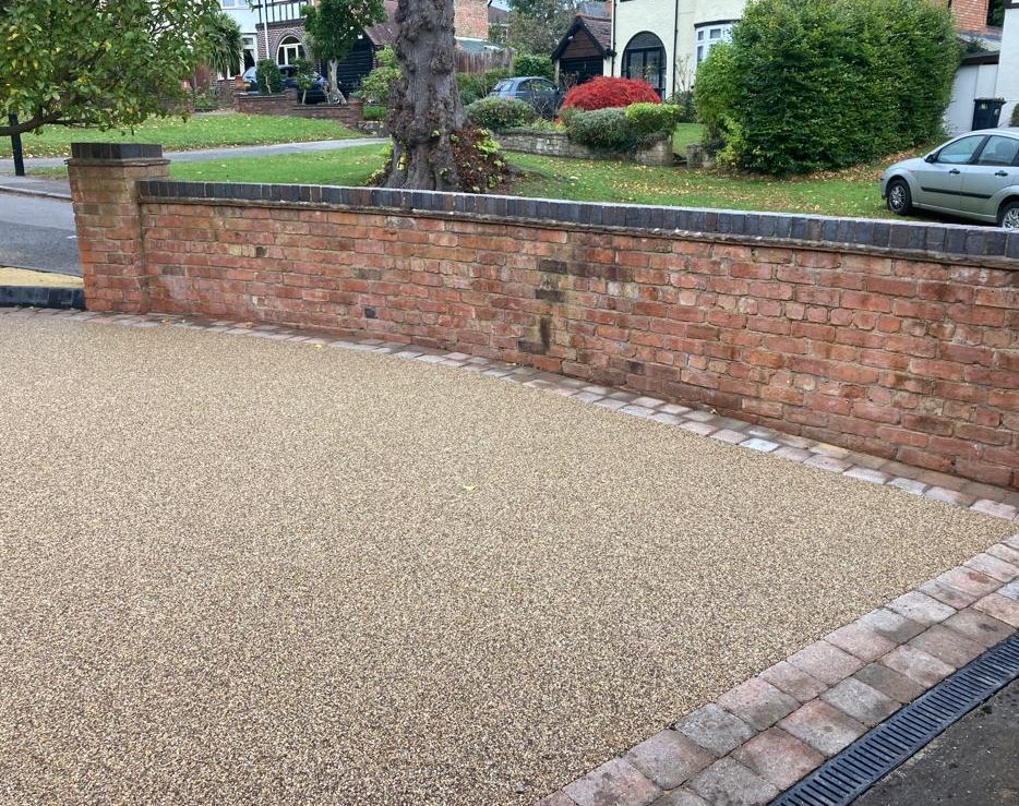 resin patio and resin driveway with block paving edging