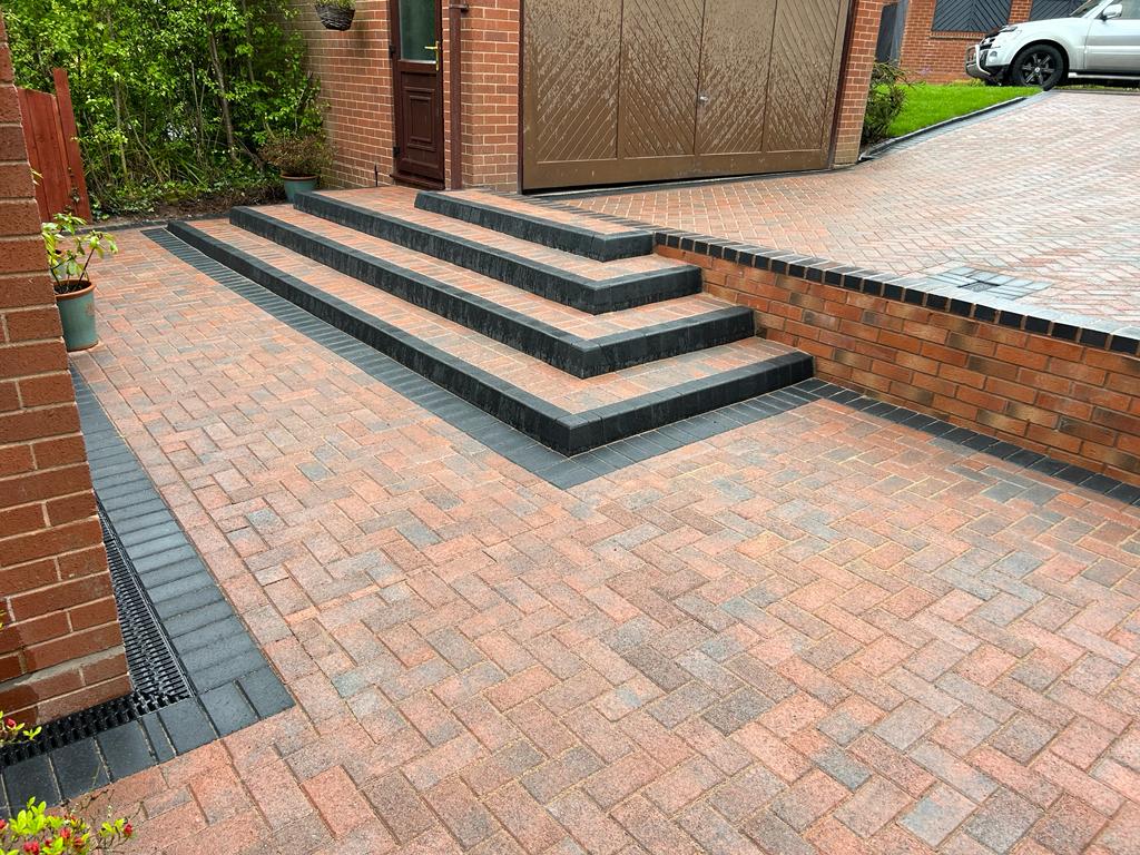 Brick Paved Driveway in autumn gold, up to 4 steps to the next paved level
