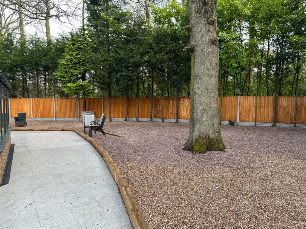 A Gravel Driveway with an oak tree in the centre