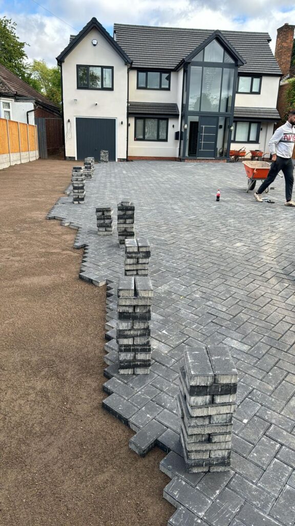 Driveways in Birmingham Grey Block paving being laid