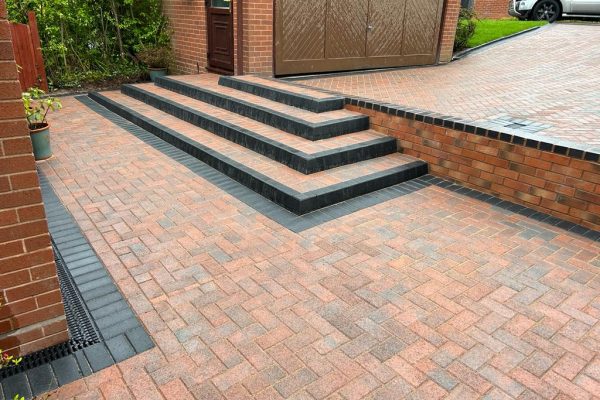 Brick Paved Driveway in autumn gold, up to 4 steps to the next paved level