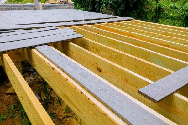 New Wooden Decking company and composite decking being installed